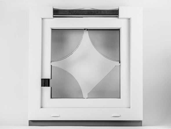 Back/exterior view of Decco 82 Educational window sample. It has variates of glass and spacer bars. Also you can see the inside of the frame.